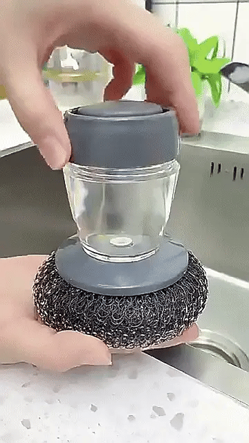فرشاة غسيل الأطباق السائلة